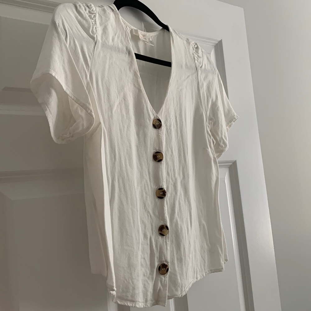 White V-neck button down top